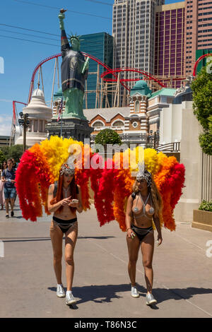 Girls dressed as Brazilian Samba dancers for tips on the Las Vegas Strip. Las Vegas, Nevada, United States of America Stock Photo