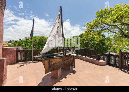 Small scale replica of a wooden boat on display at Oman House, Fort Jesus, Mombasa, Kenya Stock Photo