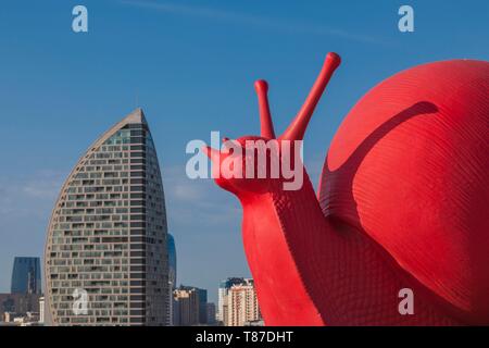 Azerbaijan, Baku, Trump Hotel and Tower and big red snail by the Heydar Aliyev Center Stock Photo