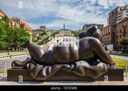 Armenia, Yerevan, The Cascade, Woman Smoking Cigarette, statue by Fernando Botero Stock Photo