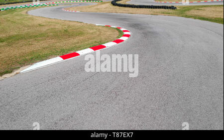 Curves on karting race track, aerial view background. Stock Photo