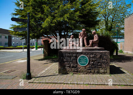 statue by colin telfer at the entrance to westlakes academy egremont Stock Photo