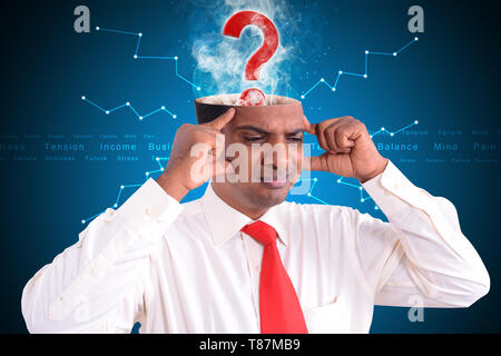 Filled out question inside businessman head Stock Photo