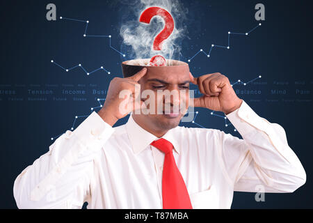 Filled out question inside businessman head Stock Photo