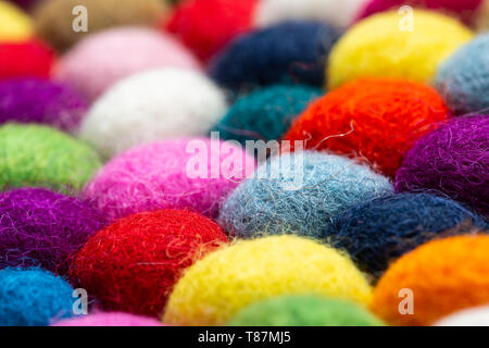 Multicolored felt ball rug detail, colorful texture Stock Photo