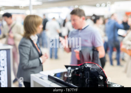 Blured image of businesspeople socializing and networking at business and entrepreneurship meeting. Stock Photo