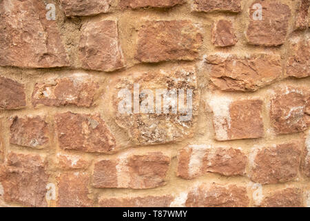 Stone wall made from irregular size blocks Stock Photo