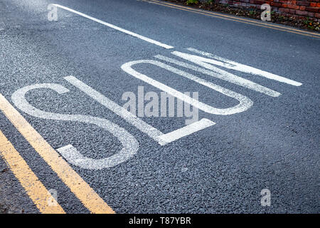 Go Slow Road marking Yester Road Chislehurst Stock Photo