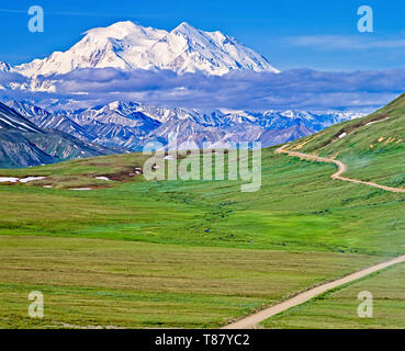 Denali, Mount McKinley and Thorofare Pass seen from Stony Hill Overlook in late spring, Denali National Park and Reserve, Alaska, USA 1994 Fuji Velvia Stock Photo