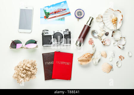 Composition with passports, smartphone and travel objects on white background Stock Photo