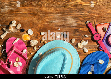 Composition with beach items on wooden background Stock Photo