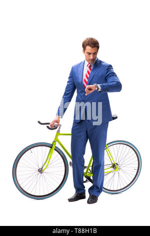 Young businessman using bike to commute to the office Stock Photo