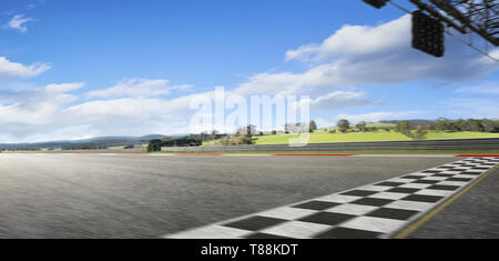Motion blurred racetrack with start and finish line , morning scene . Stock Photo