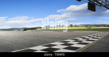 Motion blurred racetrack with start and finish line , morning scene . Stock Photo