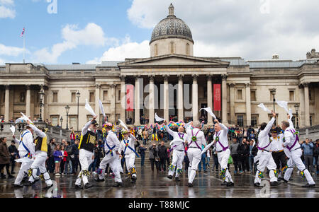 Trafalgar Square, London, UK 11 May 2019 Morris dancers take part in the 'Westminster day of dance'. This is an annual event of dance. Stock Photo