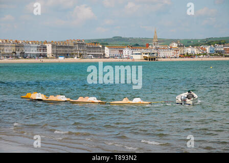 Weymouth, Dorset, UK. 11th May 2019. Extra pedalos are brought into service as Weymouth gets busier. credit: stuart fretwell.Alamy Live News Stock Photo