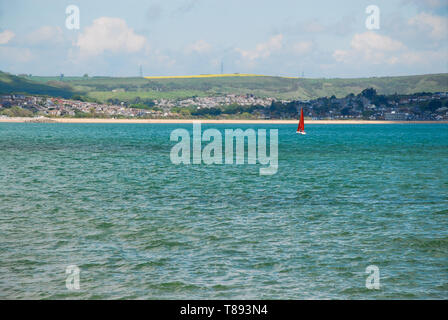 Weymouth, Dorset, UK. 11th May 2019. A lone yachtsman enjoys the perfect sailing weather in sunny Weymouth Bay. credit: stuart fretwell/ Alamy Live News Stock Photo