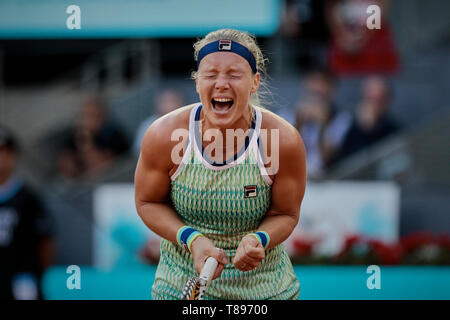 Kiki Bertens of the Netherlands seen in action against Simon Halep of Romania during the Mutua Madrid Open Masters match on day eight at Caja Magica in Madrid, Spain. Kiki Bertens beat Simona Halep. Stock Photo