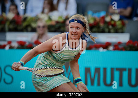 Kiki Bertens of the Netherlands seen in action against Simon Halep of Romania during the Mutua Madrid Open Masters match on day eight at Caja Magica in Madrid, Spain. Kiki Bertens beat Simona Halep. Stock Photo