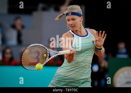 Kiki Bertens of the Netherlands seen in action against Simon Halep of Romania during the Mutua Madrid Open Masters match on day eight at Caja Magica in Madrid, Spain. Kiki Bertens beat Simona Halep. Stock Photo