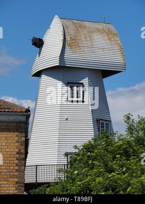 Sheerness, Kent, UK. 12th May, 2019. National Mills Weekend is the annual festival celebrating the UK's milling heritage. Pictured is Watson's Mill (formerly the Great Mill) in Sheerness which lies close to the town centre. Since 1924 the mill stood in ruin after being demolished, until being rebuilt by Caleb Watson in 2006, with fire almost destroying the rebuild in 2008 before it was due to be finished. It's a prominent local landmark but not open to the public; the ground floor has been taken over by a local insurance company. It's a Grade II  smock mill. Credit: James Bell/Alamy Live News Stock Photo