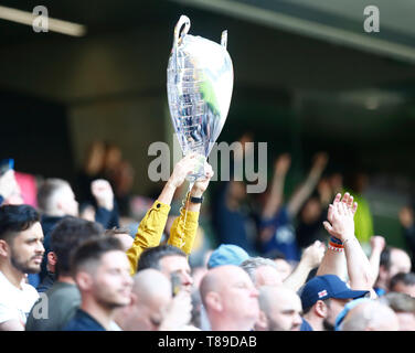 London, UK. 12th May, 2019.  Spurs Fan shows of the Champion League Cup during English Premier League between Tottenham Hotspur and Everton at Tottenham Hotspur Stadium , London, UK on 12 May 2019 Credit Action Foto Sport  FA Premier League and Football League images are subject to DataCo Licence. Editorial use ONLY. No print sales. No personal use sales. NO UNPAID USE Credit: Action Foto Sport/Alamy Live News Stock Photo