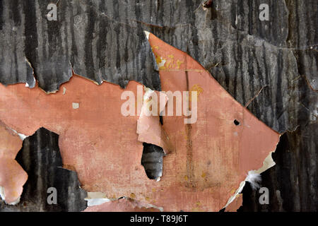 Paint peeling off plastered wall Stock Photo