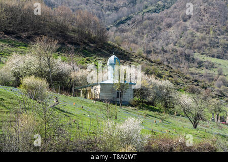 Lahic, Ismayilli region, Azerbaijan - April 28, 2019. Holy shrine at a cemetery in Lahic village of Azerbaijan. Stock Photo