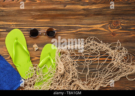 Composition with beach items on wooden background Stock Photo
