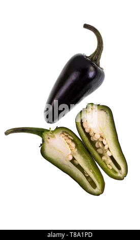 The Purple Jalapeno is a medium sized chili pepper of the species Capsicum annuum, starting off green and maturing to a dark purple color. Stock Photo