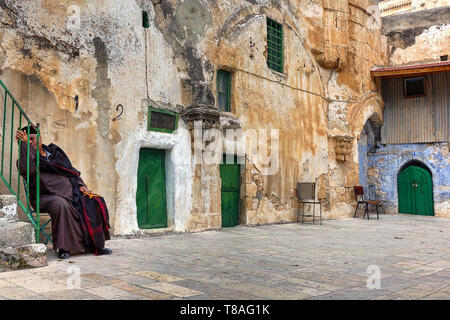 The old yard of the Ethiopian monastery (also known as Deir El-Sultan) located on the roof of the Church of the Holy Sepulchre, Old City of Jerusalem Stock Photo