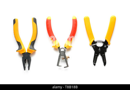 Pliers and wire strippers on white background Stock Photo