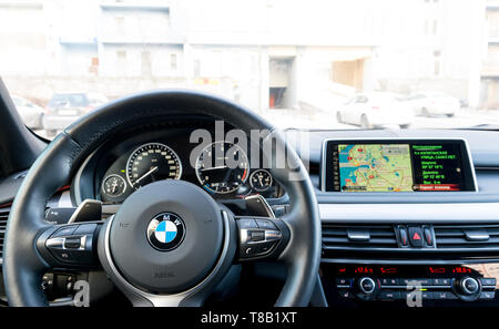 Sankt-Petersburg, Russia, March 05, 2017 BMW X5M 2017, close up of steering wheel with navigation screen multimedia system, car interior details, on t Stock Photo