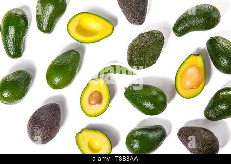 Ripe fresh avocados on white background Stock Photo
