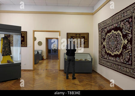 Ornately embroidered Suzani displayed at the Museum of Applied Arts situated in the former home of Imperial Russian diplomat Alexander Polovtsev in the city of Tashkent capital of Uzbekistan Stock Photo