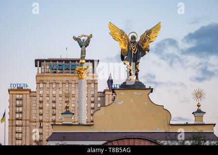 Statue of Berehynia, monument of Independence and statue of the Archangel Michael on Maidan square in Kyiv Stock Photo