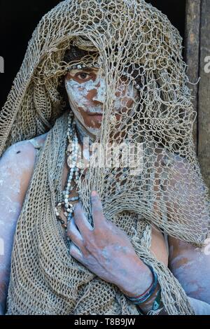 Papua New Guinea, Hela Province, Hulis Tribe, Kobe Tumbiali Village, traditionally dressed woman for mourning Stock Photo