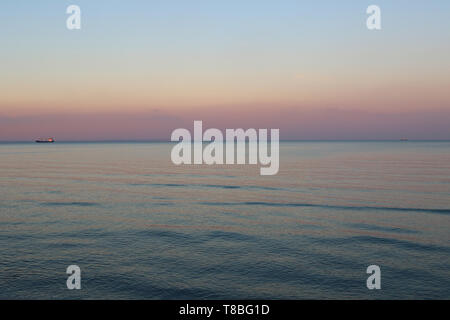 View of Mediterranean sea in the evening, Larnaca, Cyprus Stock Photo