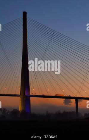 France, between Calvados and Seine Maritime, the Pont de Normandie (Normandy Bridge) at dawn, it spans the Seine to connect the towns of Honfleur and Le Havre Stock Photo