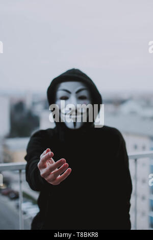Take a look behind the mask Stock Photo - Alamy