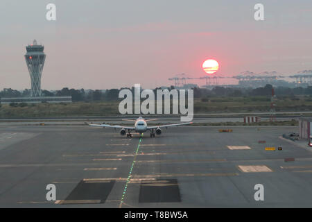 sunrise at the airport of barcelona