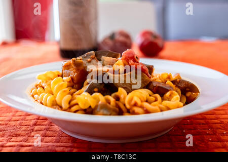 Pasta alla norma, with tomatoes and eggplants, a recipie from sicily Stock Photo