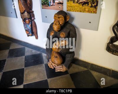 Church of Our Lady Victorious and The Infant Jesus of Prague This wooden carving of an ape is about the church's missionary work in Africa Stock Photo