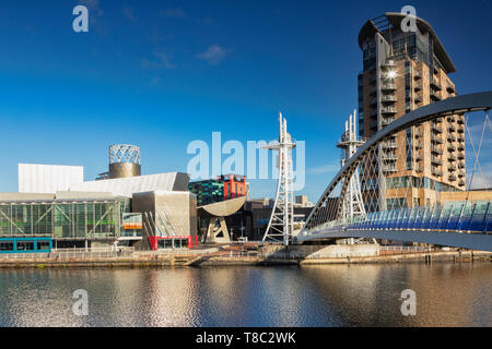 2 November 2018: Salford Quays, Manchester, UK - Pier 8 and the Lowry Bridge on a lovely sunny autumn day, with clear blue sky. Stock Photo