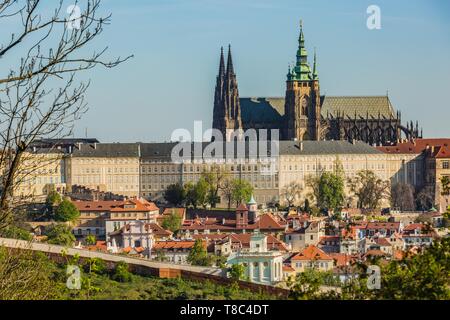 Prague, Czech Republic / Europe - April 22 2019: View of Hradcany and St Vitus cathedral from Petrin hill overlooking historical buildings. Stock Photo