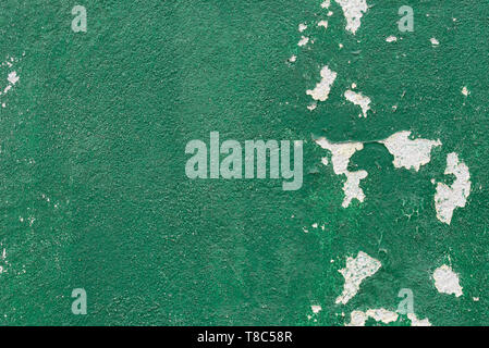 old obsolete green color plastered wall background texture Stock Photo