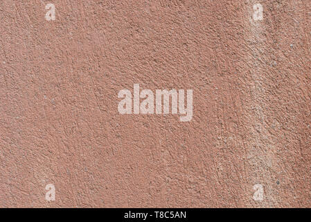 old obsolete brown color plastered wall background texture Stock Photo