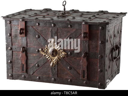 A German strong box, mid-18th century Rectangular body made from sheet iron with broad strap fittings. False keyhole on the front side with large escutcheon in relief. Hinged lid with central keyhole (the key is a replacement). On the inside mechanism with seven latches. Iron cover plate with coloured mounting, depiction of a bird sitting on a branch, flanked by trees. On the front side two hasps for padlocks. Two movable carrying handles on the sides. The bottom with one repair. Dimensions 38 x 65 x 39 cm. historic, historical, handicrafts, hand, Additional-Rights-Clearance-Info-Not-Available Stock Photo