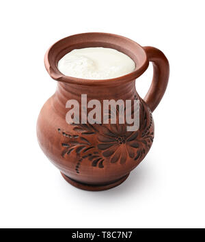 a white ceramic milk pot on a white background Stock Photo - Alamy