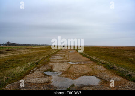 Wartime concrete road, Shingle Street, Suffolk, UK. Stock Photo